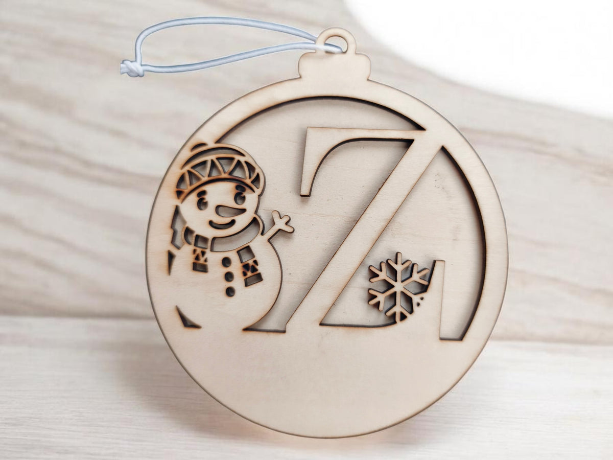 Boule de Noël bonhomme de neige initial