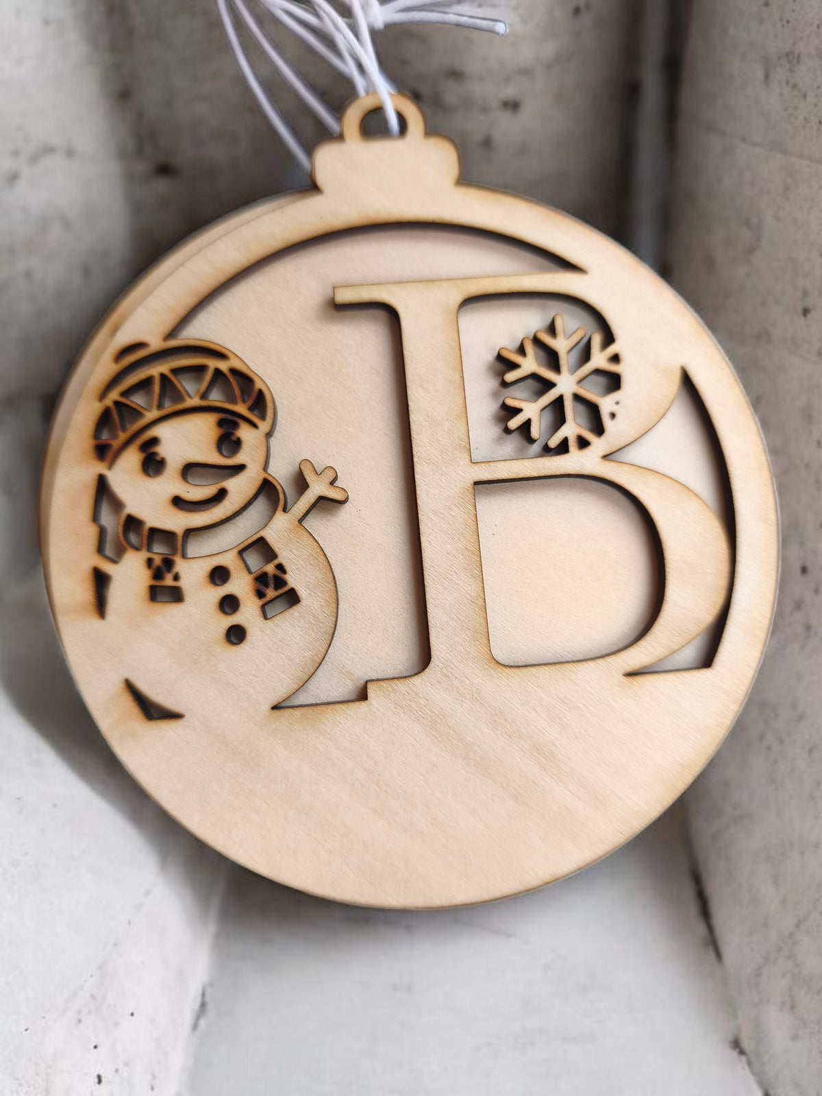 Boule de Noël bonhomme de neige initial