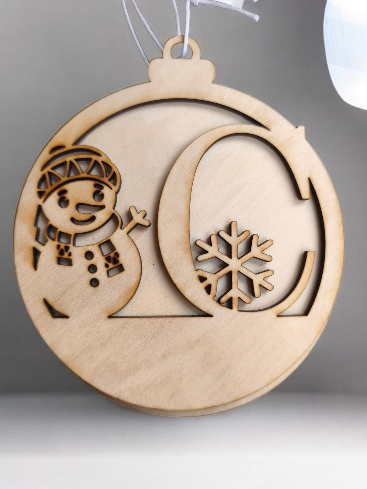 Boule de Noël bonhomme de neige initial