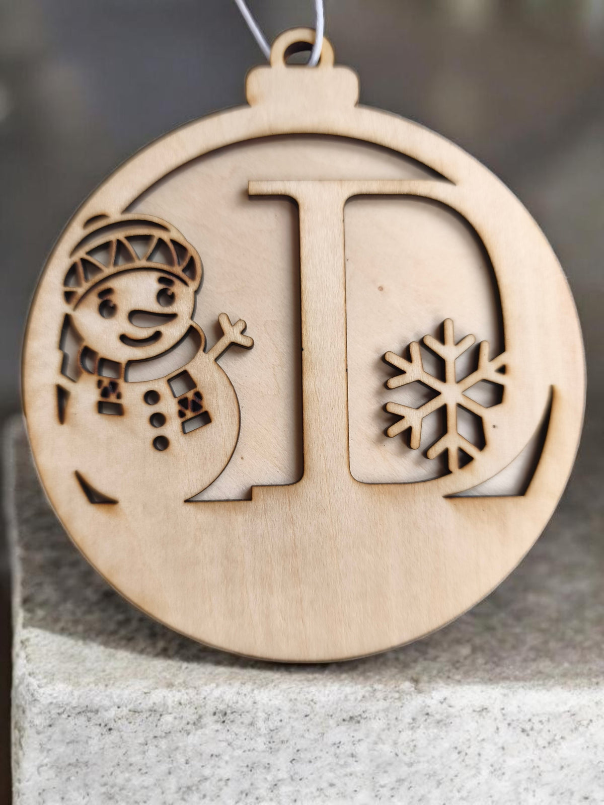 Boule de Noël bonhomme de neige initial