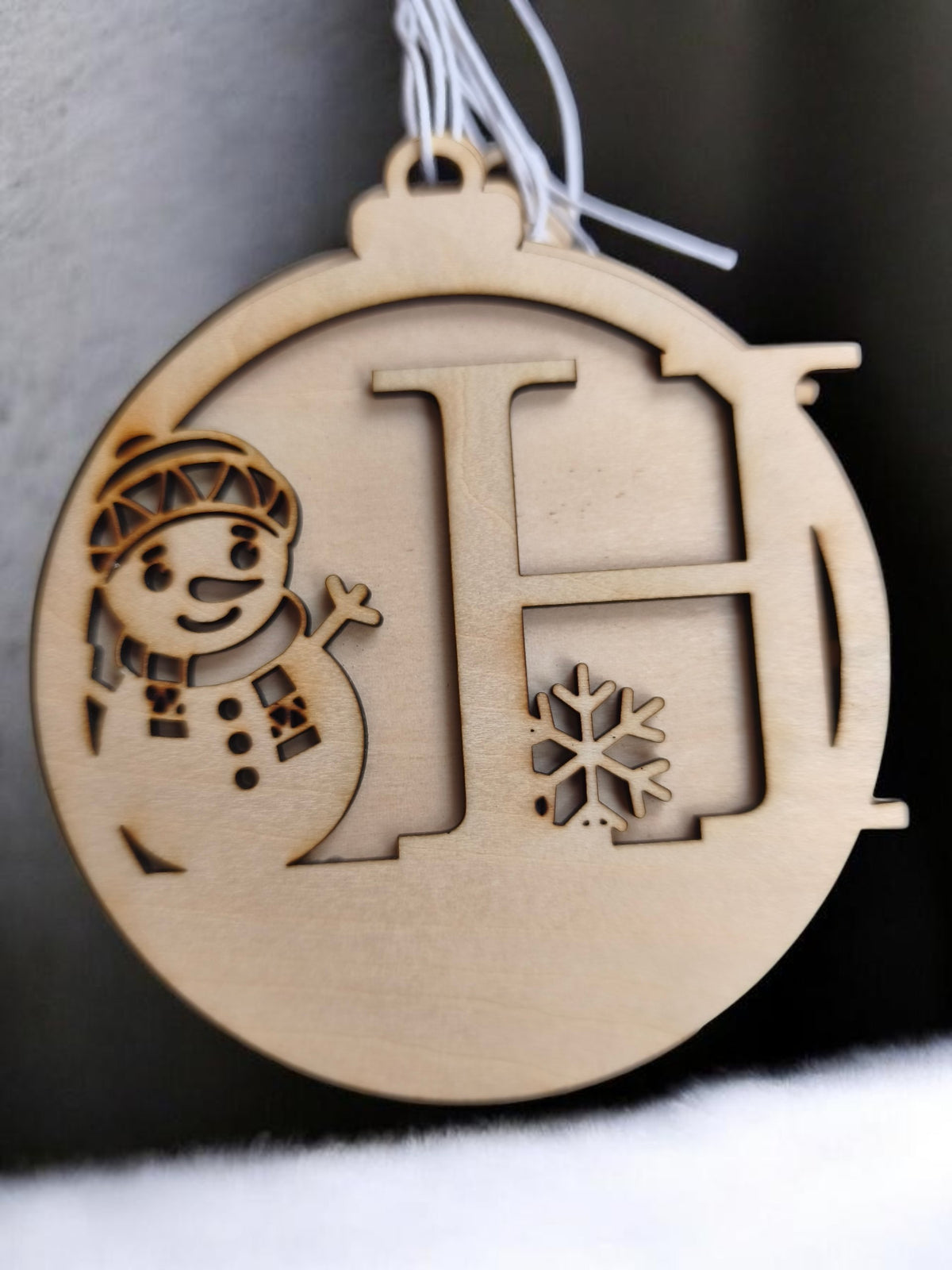 Boule de Noël bonhomme de neige initial