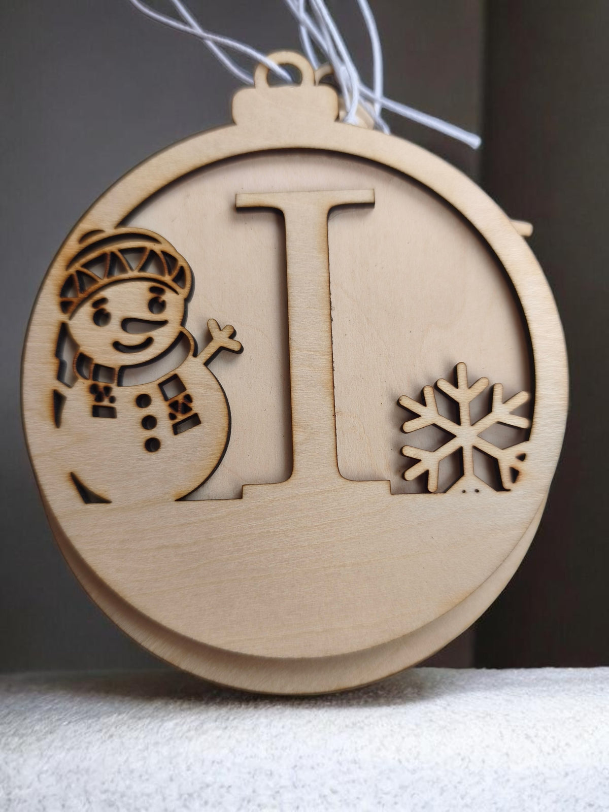 Boule de Noël bonhomme de neige initial