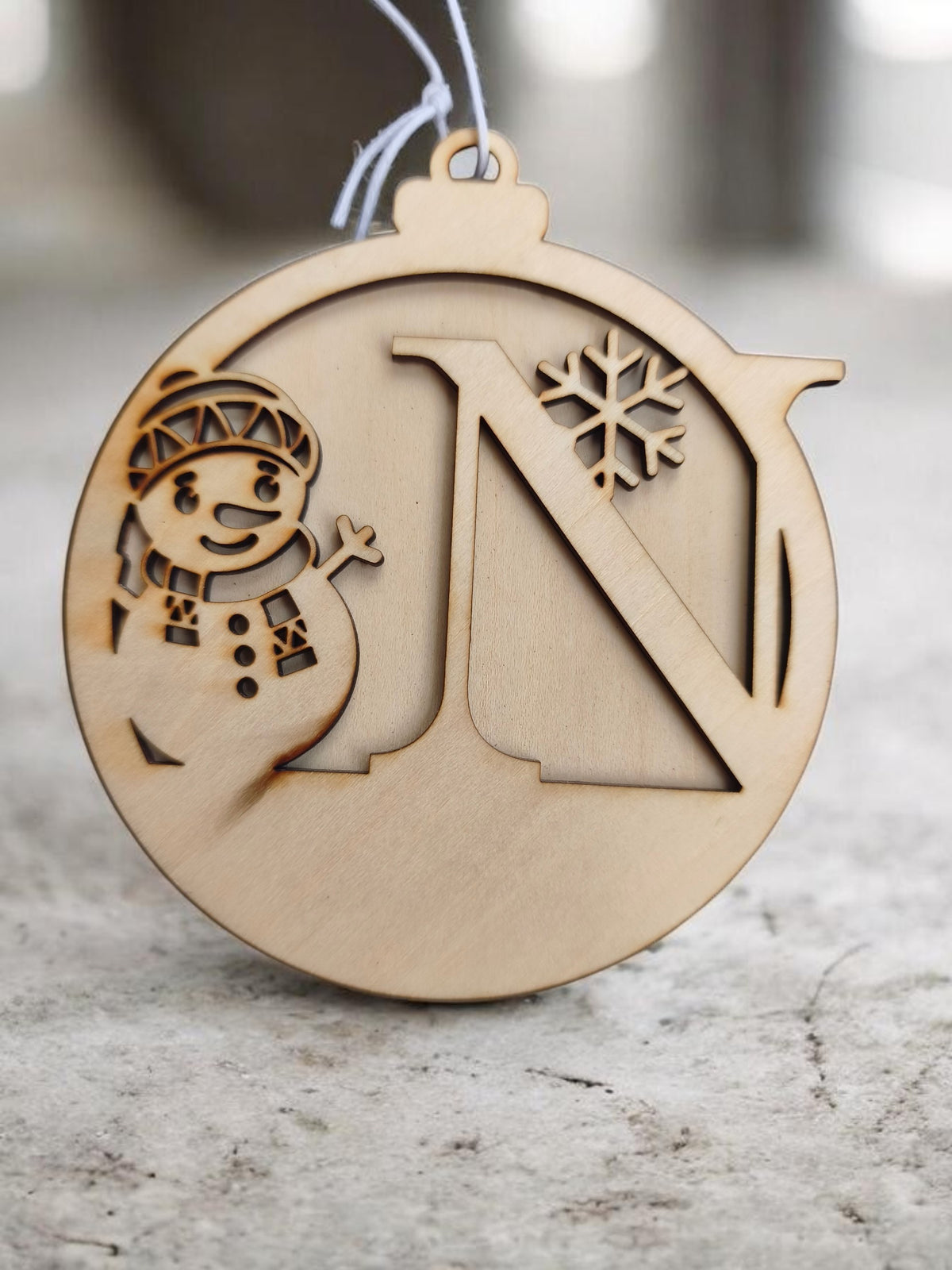Boule de Noël bonhomme de neige initial