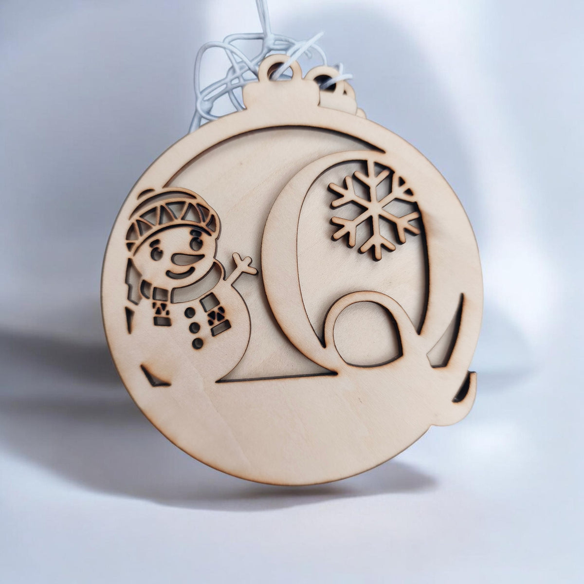 Boule de Noël bonhomme de neige initial