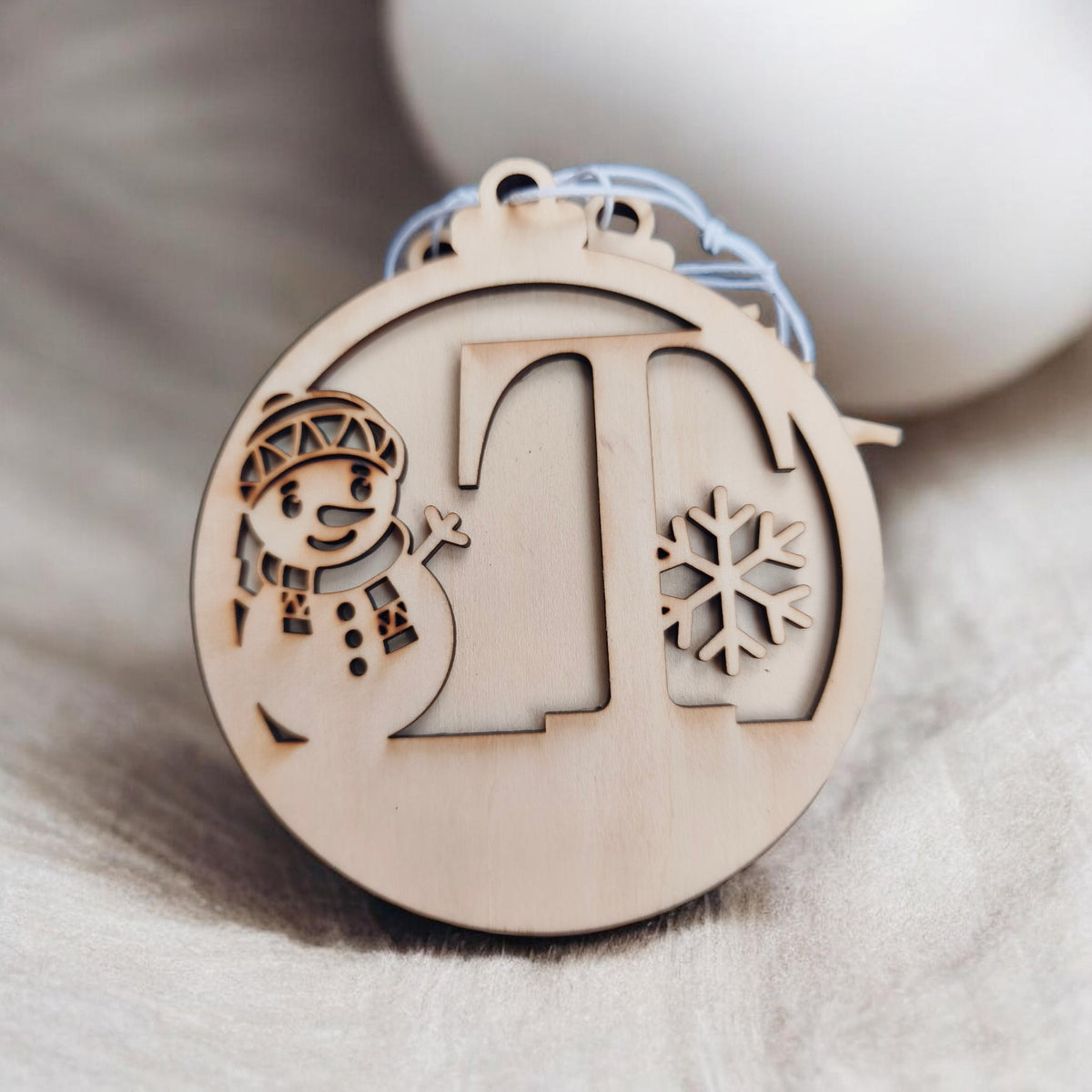 Boule de Noël bonhomme de neige initial